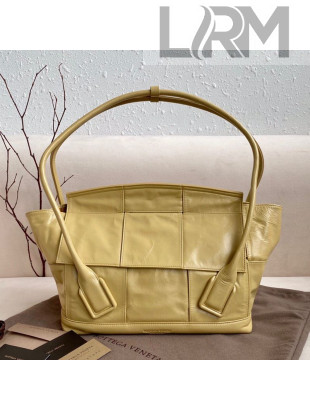 Bottega Veneta Medium Arco Slouch Top Handle Bag in Maxi-Woven Shiny Paper Calfskin Yellow 2020