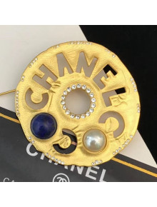 Chanel Round Metal Cutout Lettering Brooch AB1602 Gold/Blue 2019