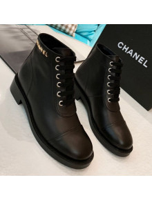 Chanel Calfskin Metal Logo Flat Short Boot Black 2019